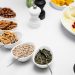 A top view of a diverse breakfast spread with nuts and fresh fruits for a nutritious start.
